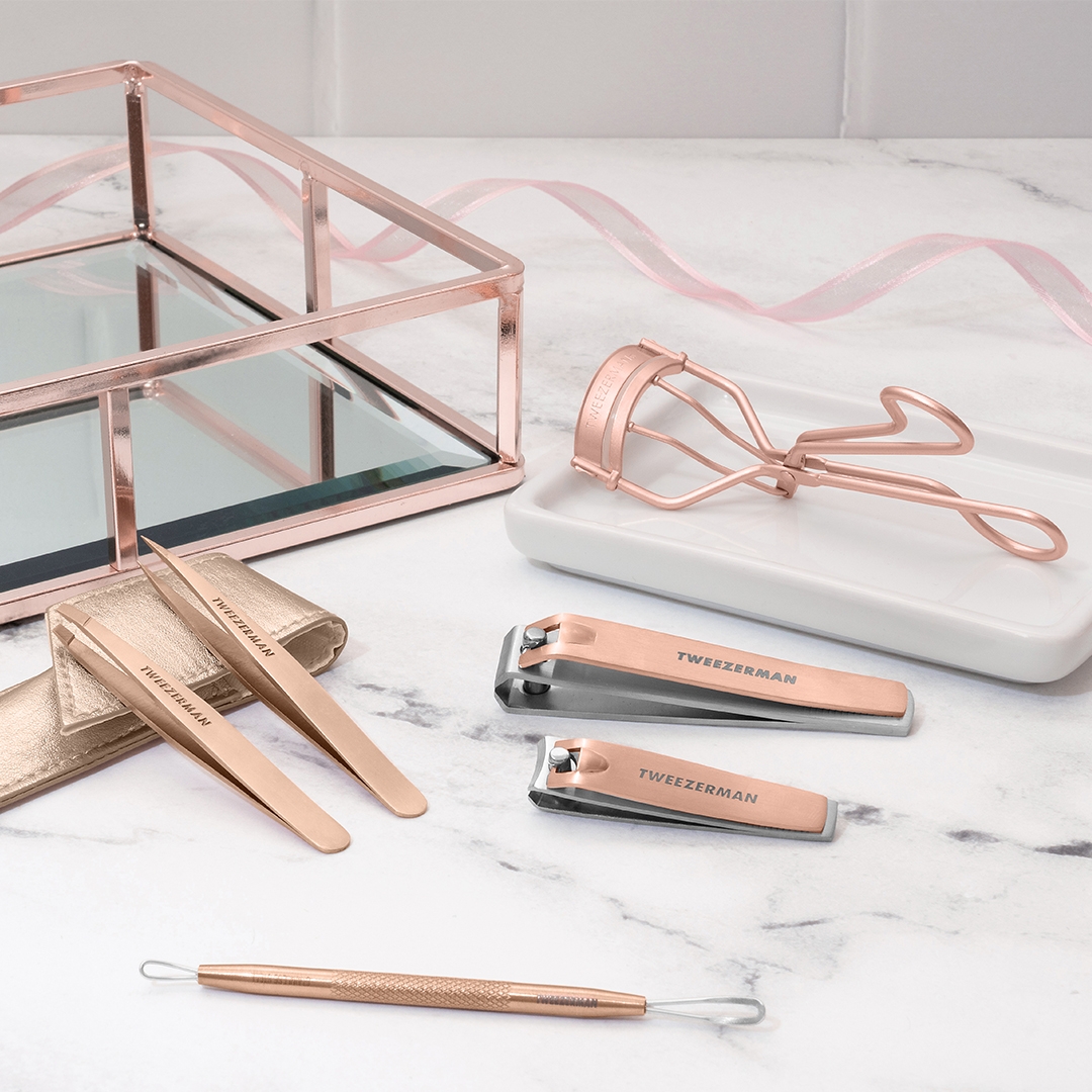 ROSE GOLD GIFTS. ROSE GOLD SLANT TWEEZER, POINT TWEEZER, COMBO CLIPPER SET, AND LASH CURLER