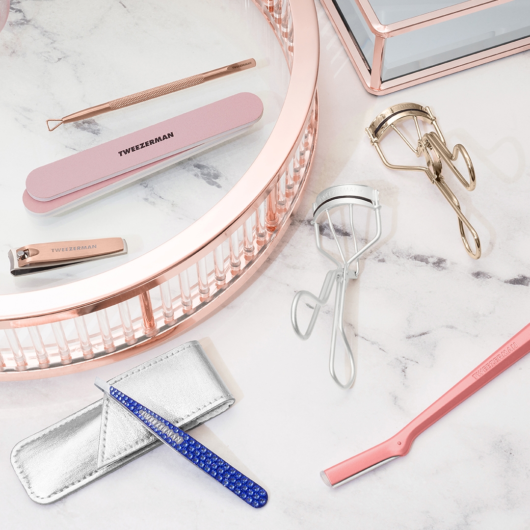 FOR ANY MOM ON YOUR LIST. ROSE GOLD MANICURE KIT WITH FILE, PUSHY, AND NAIL CLIPPER, BLUE SAPPHIRE swarovski CRYSTAL SLANT TWEEZER, CLASSIC LASH CURLER, GOLD CLASH CURLER, ROSE TEA FACIAL RAZOR.