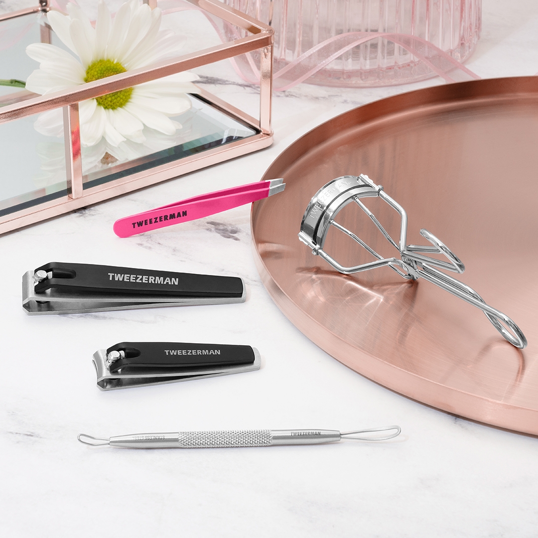 GIFTS $20 AND UNDER. PINK SLANT TWEEZER, PRECISION COMBO CLIPPER IN BLACK, NONSLIP SKINCARE TOOL, CLASSIC LASH CURLER.